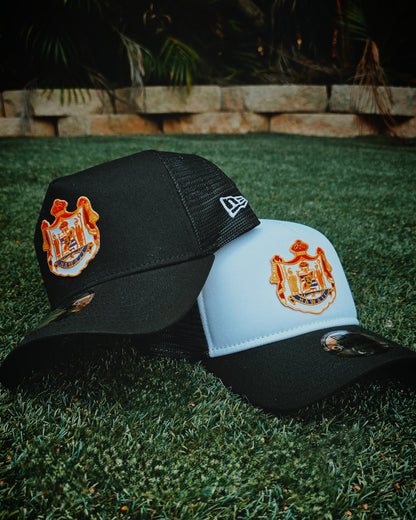 COAT OF ARMS NEW ERA TRUCKER